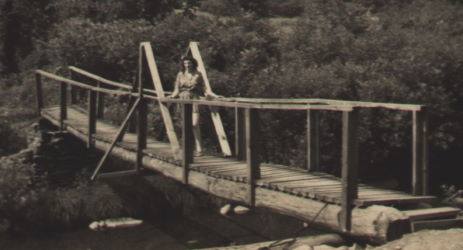 People posing with bridges