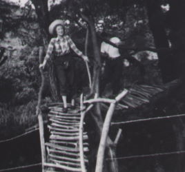 People posing with bridges