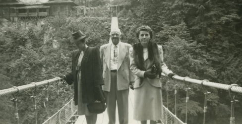 People posing with bridges